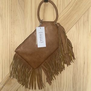Tan wrist purse with fringe
